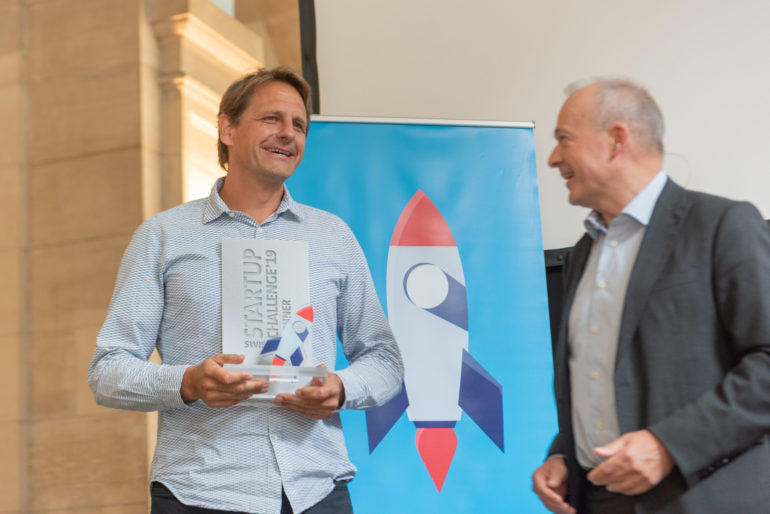 Christoph Küffer, People-Analytix, with Swisscom CEO Urs Schaeppi.